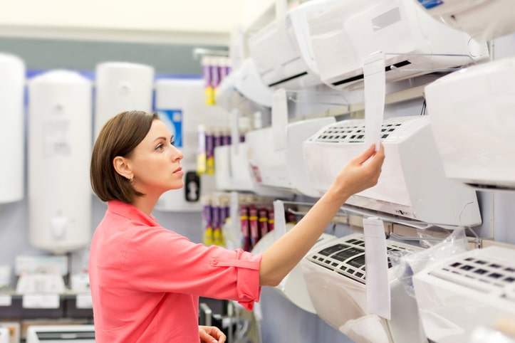 Woman shopping for a new air conditioner